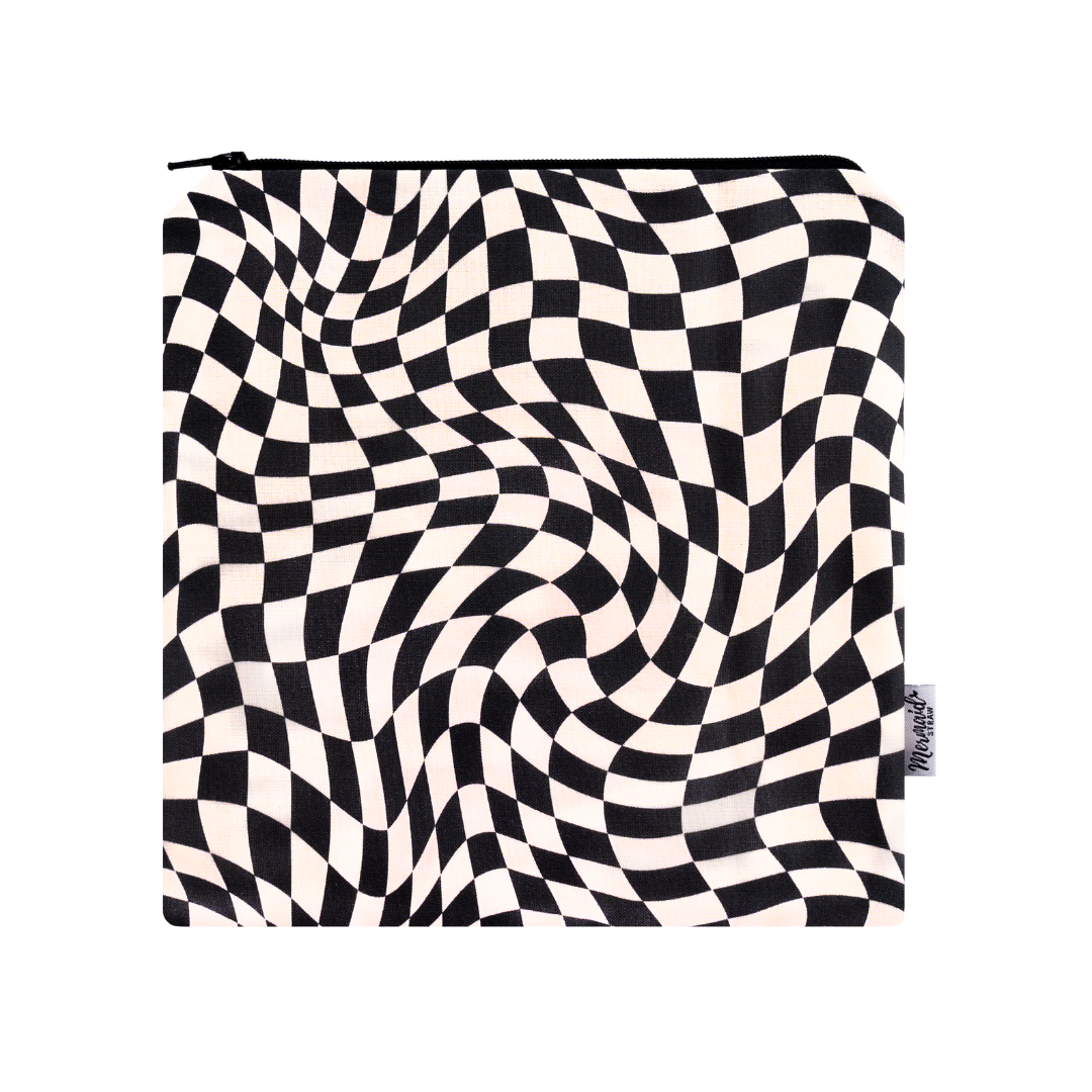 black and cream wavy checker patterned, handmade and reusable essentials bag; mermaid straw